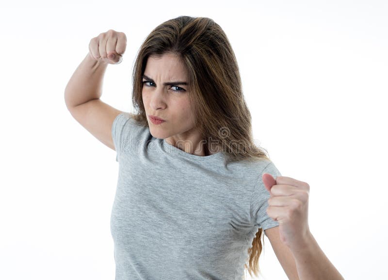 Beautiful girl looking menacingly dangerously from under the forehead Stock  Photo - Alamy