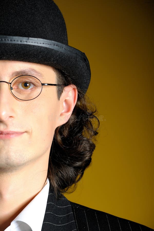 Close up young english gentleman in bowler hat