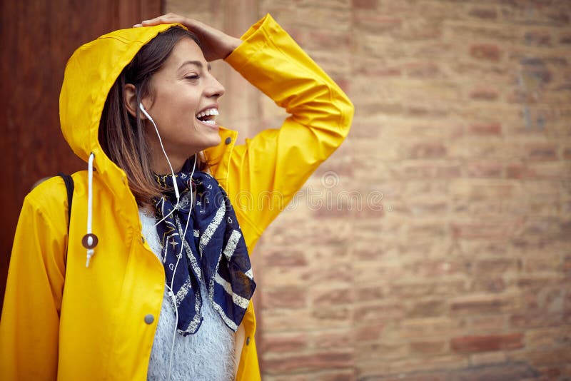 Close Up Of A Young Girl Enjoying The Music While Walking On A Rainy Day Walk Rain City Stock 