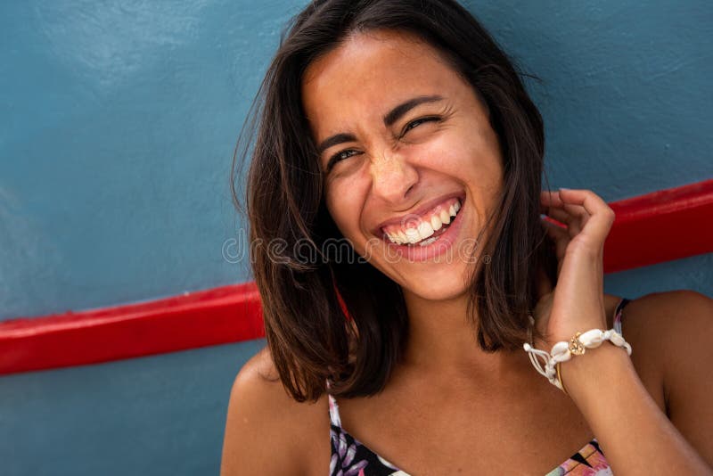 Close Up Young Latin Woman Laughing With Hand In Hair Stock Image Image Of Hispanic Confident