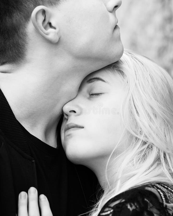 Close-up of Young Romantic Couple is Kissing Near Gray Wall Stock Photo - Image of male, love: 201854116 Close-Up Of Young Romantic Couple Is Kissing Near Gray Wall Stock Photo - Image Of Male, Love: 201854116