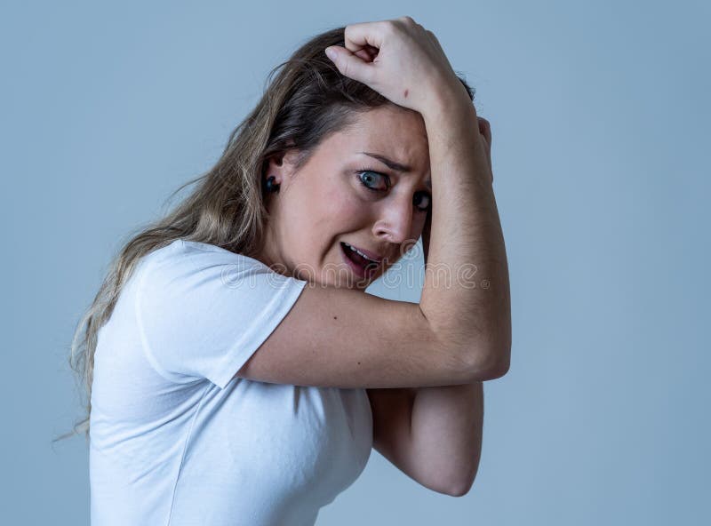 Portrait Of A Young Attractive Woman Looking Scared And Shockedhuman