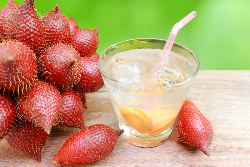 Close up zalacca fruit and zalacca juice in glass.