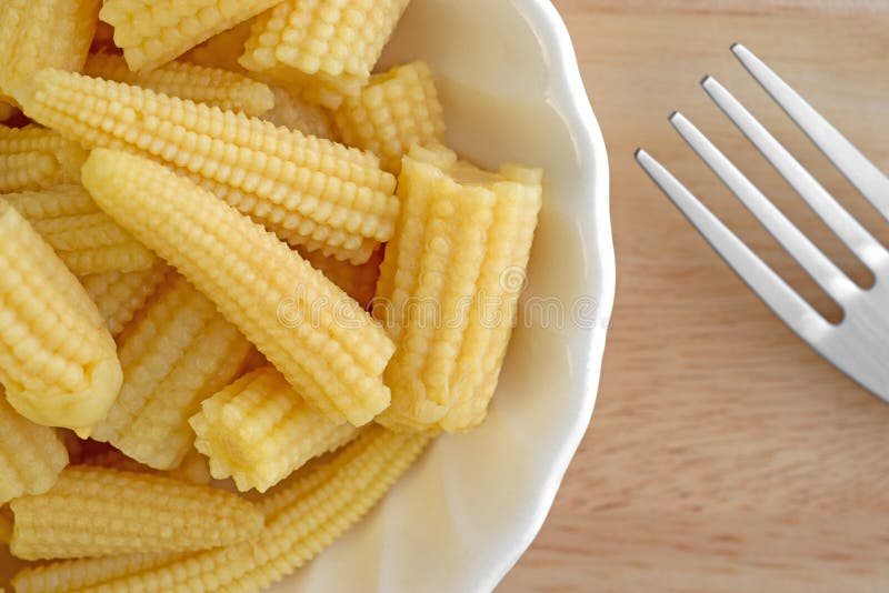 Close view of baby corn nuggets in bowl