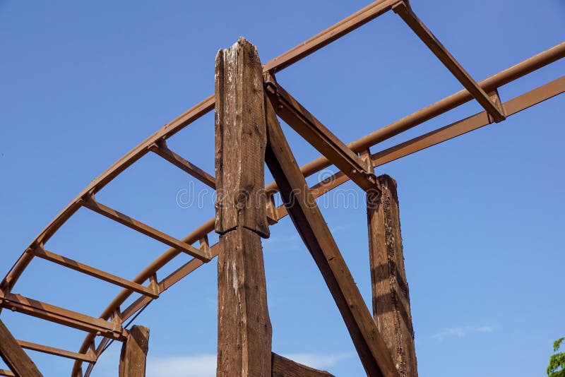 Close view on the construction of a large wooden rollercoaster stock image Close view on the construction of a large wooden rollercoaster stock image
