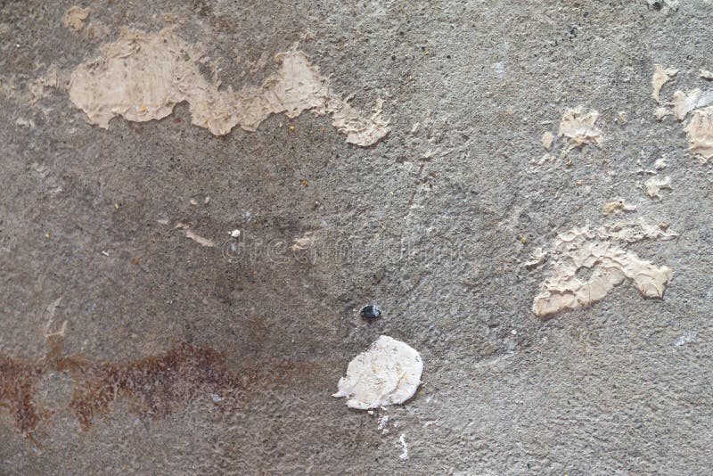 Close View of an Old Concrete Floor with Glue Buildup and Dirt Stock