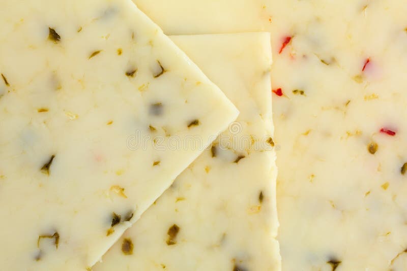 Pepper jack cheese stock image. Image of spicy, isolated 20179429