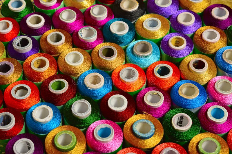 Sewing threads of various color on spindles royalty free stock photos Sewing threads of various color on spindles royalty free stock photos