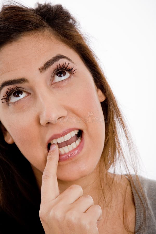 Close view of thinking woman looking up