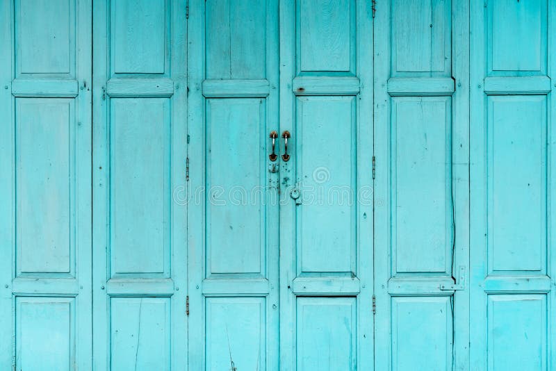 Closed green or blue wooden door. Vintage front door abstract background. Abandoned old house. Old wooden door texture royalty free stock images Closed green or blue wooden door. Vintage front door abstract background. Abandoned old house. Old wooden door texture royalty free stock images