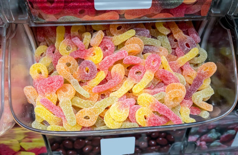 Closed up fizzy and sour gummy jelly in plastic container royalty free stock images Closed up fizzy and sour gummy jelly in plastic container royalty free stock images