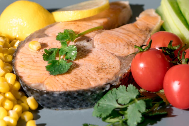 Closed-up Grilled Fish Salmon Fillet With Fresh Vegetable ...