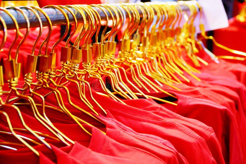 Closed up Red shirts on a rack in the shopping mall stock images Closed up Red shirts on a rack in the shopping mall stock images
