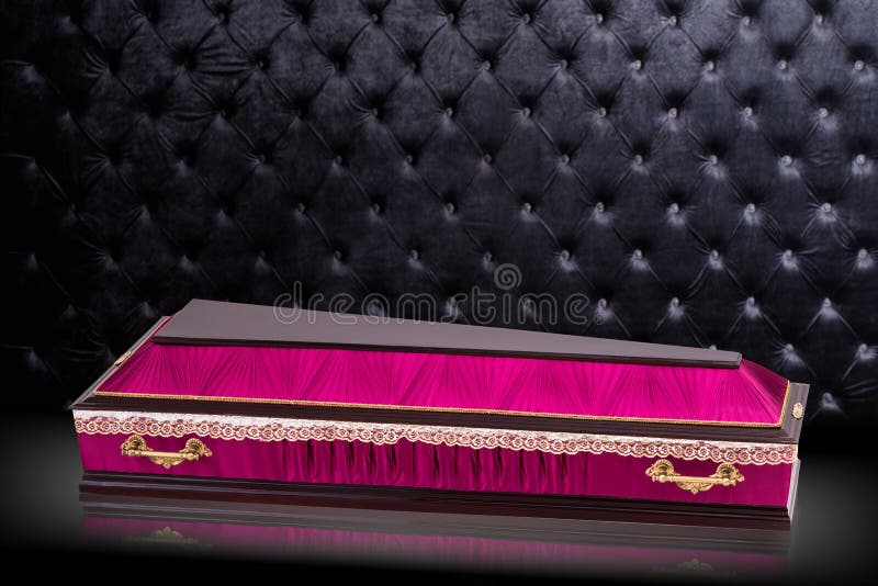 Closed wooden color pink coffin isolated on gray luxury background. 
