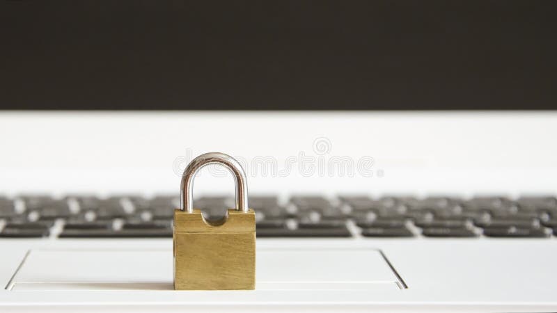 Yellow castle stands on a white laptop stock photography Yellow castle stands on a white laptop stock photography