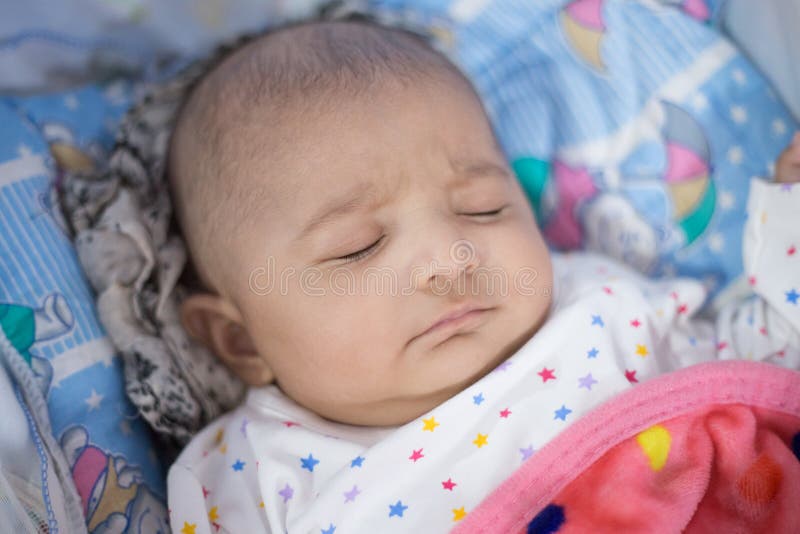 Closeup of an Indian Infant baby sleeping royalty free stock photo Closeup of an Indian Infant baby sleeping royalty free stock photo