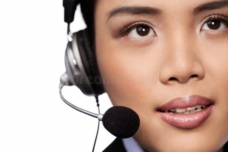 Closeup of an Asian lady wearing a headset