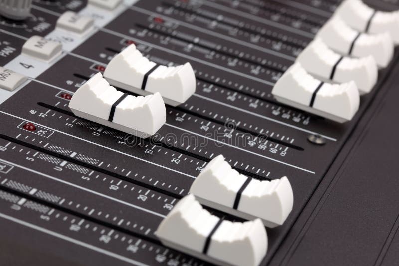 Closeup of audio mixing console.