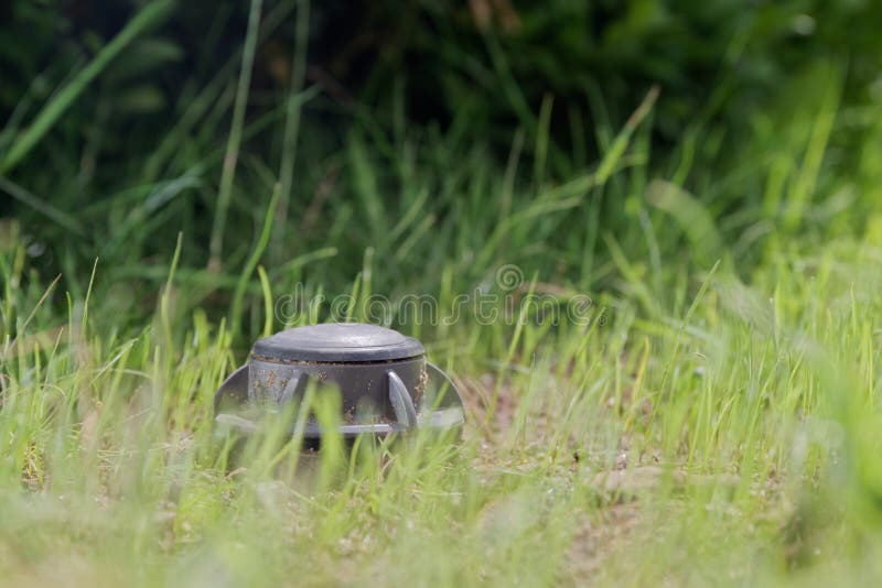 Closeup of a pop-up sprinkler in a green lawn. Closeup of an automatic pop-up sprinkler in a green lawn. Hamburg, Germany stock photography Closeup of a pop-up sprinkler in a green lawn. Closeup of an automatic pop-up sprinkler in a green lawn. Hamburg, Germany stock photography