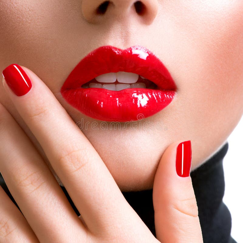 Closeup beautiful female lips with red lipstick