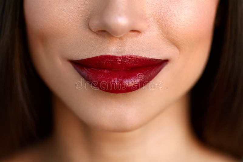 Closeup Beautiful Woman Lips With Red Lipstick. Beauty Makeup