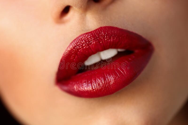 Closeup Beautiful Woman Lips With Red Lipstick. Beauty Makeup