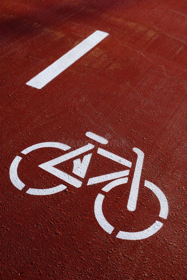 Bike lane sign on the pavement