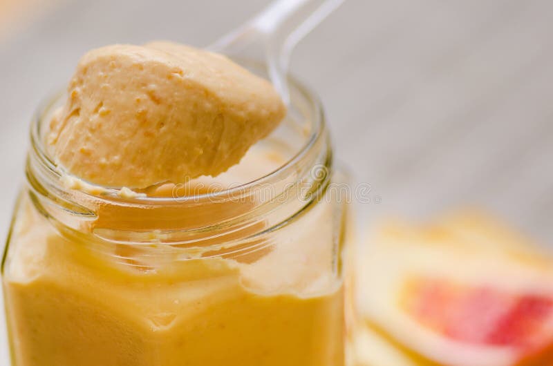 Closeup Of A Orange Poppy Flower In A Green Field Of ...