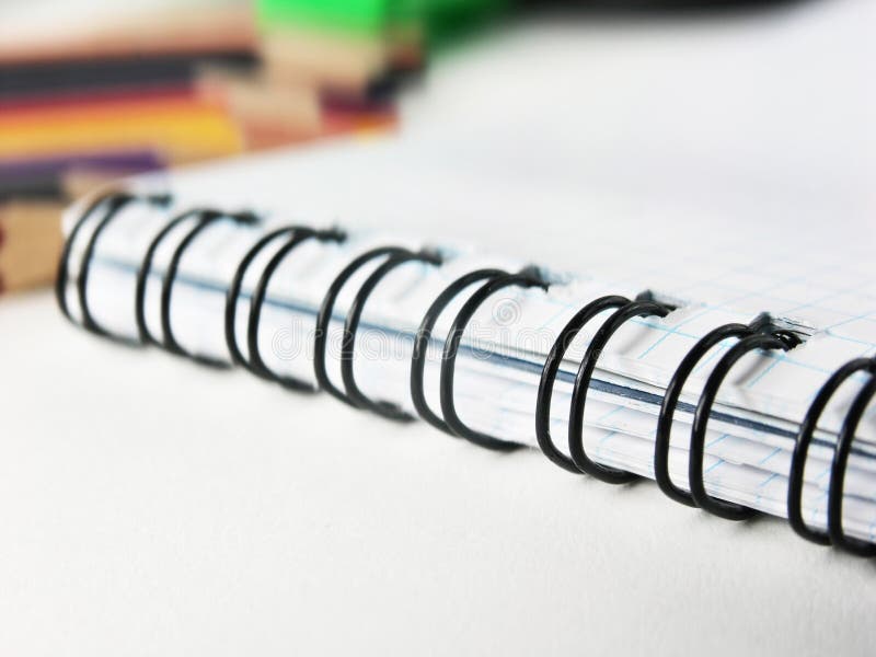 Closeup of a blurred image of notebook on a white background. photo with copy space.