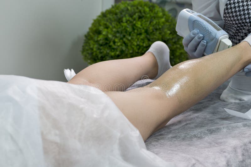 Using Hot Wax for Woman Leg in Spa. Closeup of Body Hair Removal during Hair Removal Process on Caucasian Female Leg with Stock Photo - Image of salon, strip: 252486570 Using Hot Wax for Woman Leg in Spa. Closeup of Body Hair Removal during Hair Removal Process on Caucasian Female Leg with Stock Photo - Image of salon, strip: 252486570