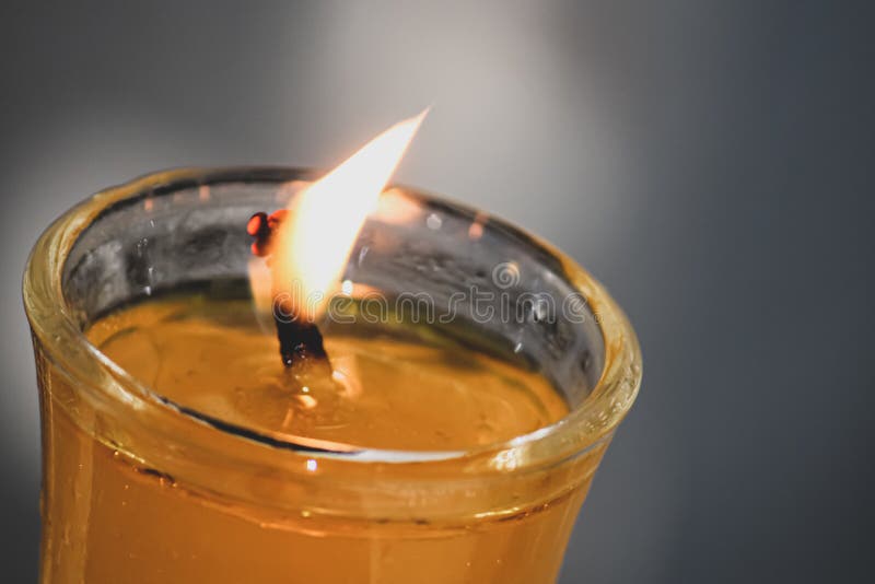 Closeup of a Burning Candle in a Glass in the Dark Stock Image Image