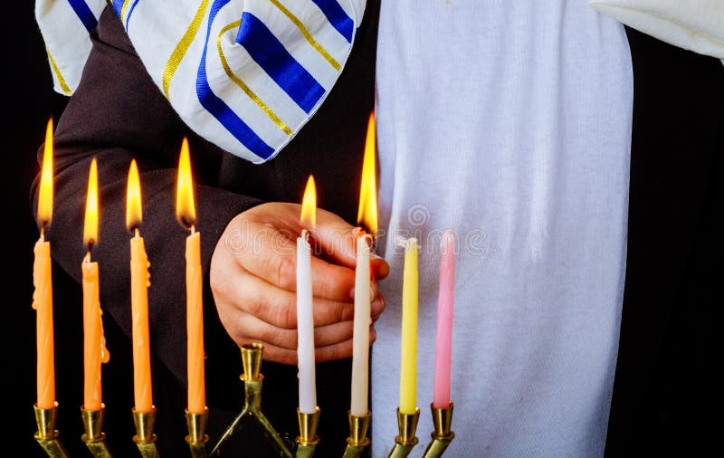 Closeup of a burning Chanukah candlestick with candles Menorah. A traditional Jewish holiday, hanukkah, hanukkiah, religion, celebration, judaism, symbol stock photography Closeup of a burning Chanukah candlestick with candles Menorah. A traditional Jewish holiday, hanukkah, hanukkiah, religion, celebration, judaism, symbol stock photography