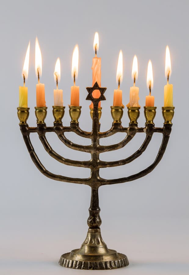 Closeup of a burning Chanukah candlestick with candles Menorah. A traditional Jewish holiday, hanukkah, hanukkiah, religion, celebration, judaism, symbol stock photo Closeup of a burning Chanukah candlestick with candles Menorah. A traditional Jewish holiday, hanukkah, hanukkiah, religion, celebration, judaism, symbol stock photo