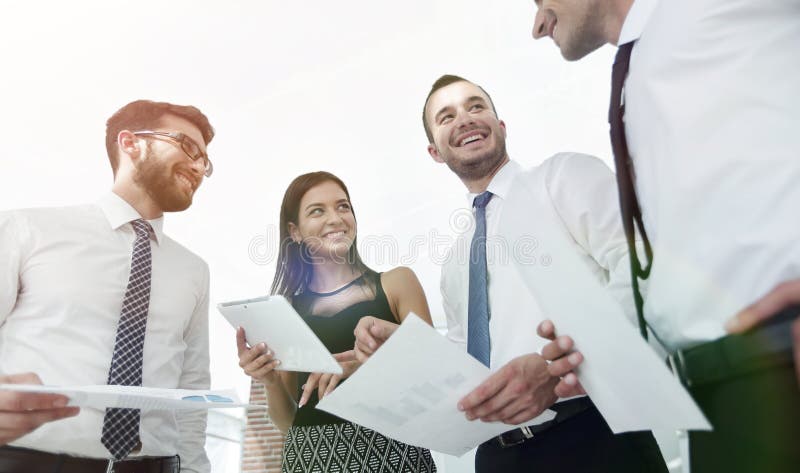Closeup of business team discussing work documents stock photography Closeup of business team discussing work documents stock photography