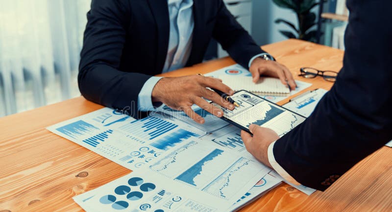Closeup busy analyst team discussing financial data on laptop. Fervent royalty free stock images