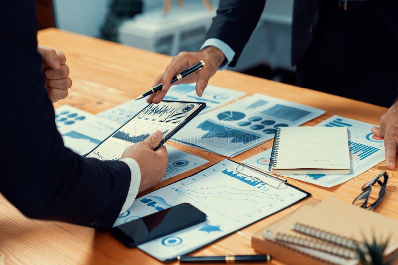 Closeup busy analyst team discussing financial data on laptop. Fervent royalty free stock photos