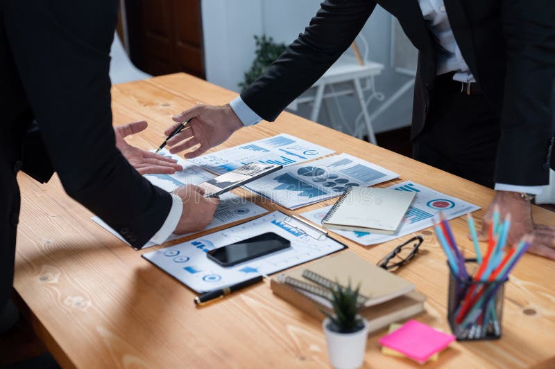 Closeup busy analyst team discussing financial data on laptop. Fervent royalty free stock photos