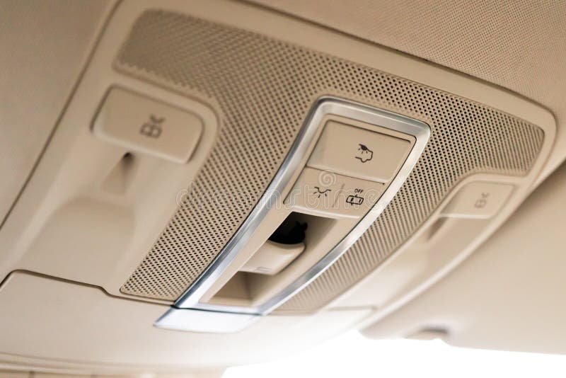 Closeup of Cabin Lights Switch in Car, Light Control Panel Inside a