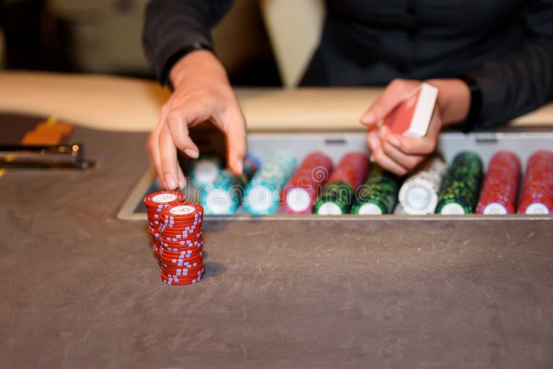 Closeup of Casino Dealer with Chips and Cards, Selective Focus Stock