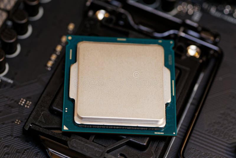 Closeup Central Processor Unit CPU ready to install on motherboard. Shallow focus. royalty free stock photography