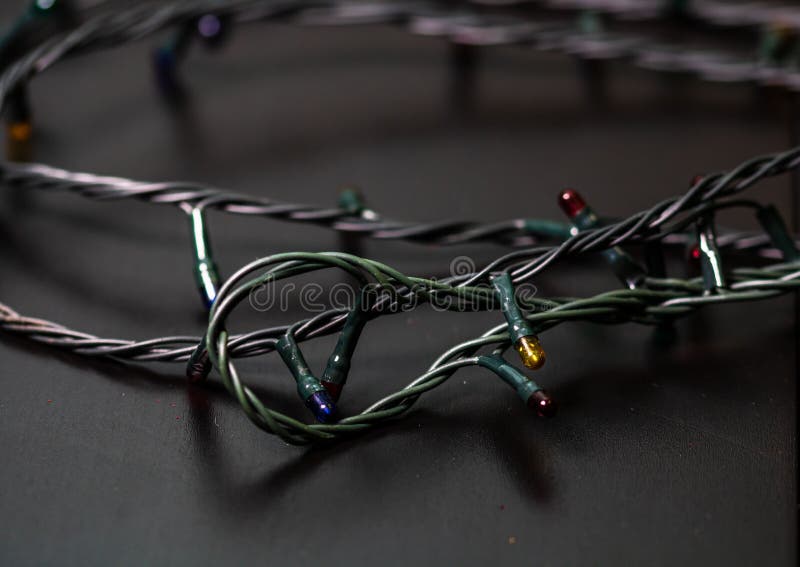 Closeup of Christmas Lights Put on a Black Surface. Stock Image Image