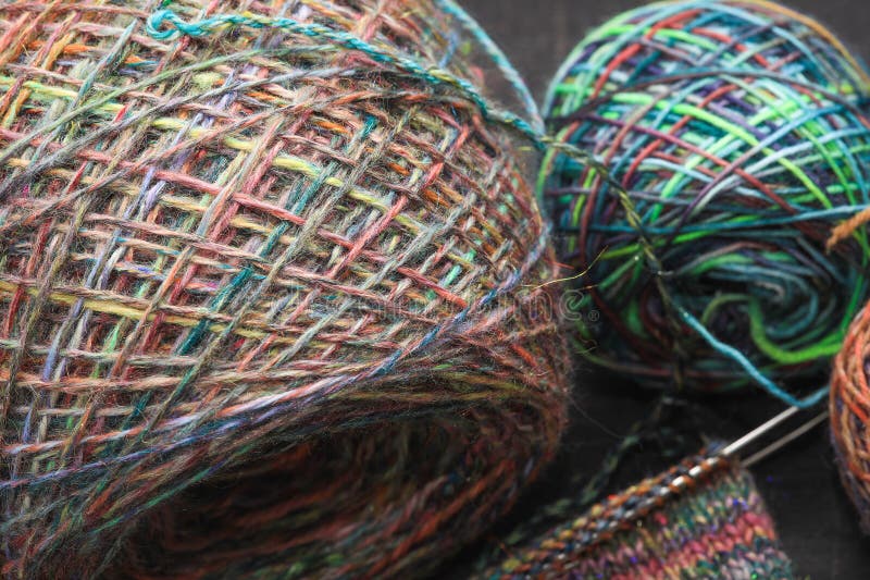 Closeup of colourful handspun and handdyed sock yarn stock photo