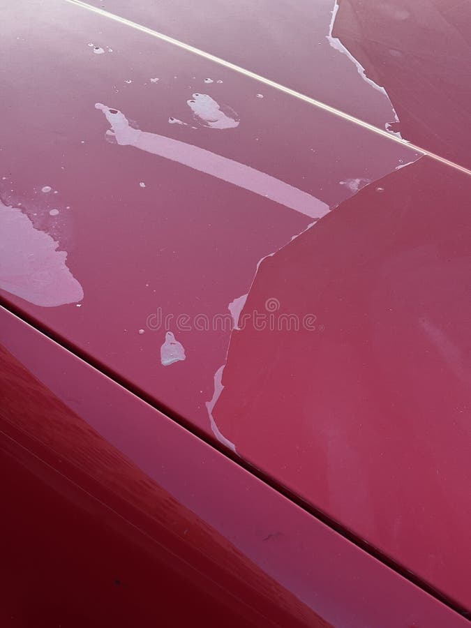 Closeup of cracked and peeling paint on an old red car stock illustration