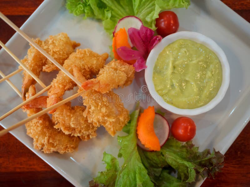 Closeup Crispy Deep Fried Battered Shrimp Serve with Vegetables and
