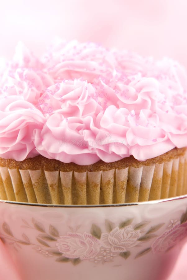 Pink Cupcake in a Teacup stock photo. Image of dessert 10852532