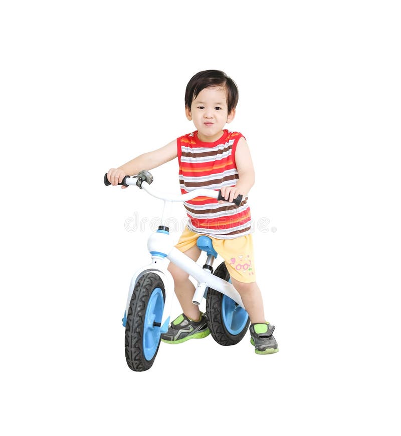 Closeup cute asian kid ride a bicycle isolated on white background