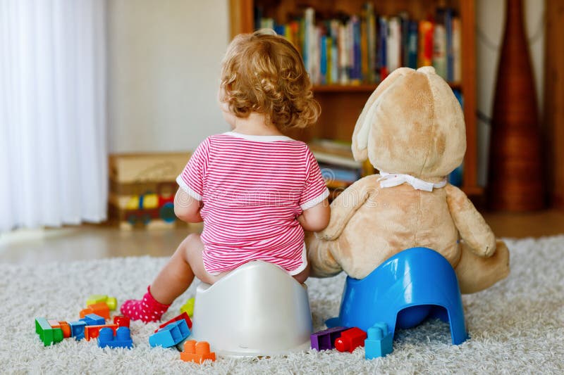 Cute Little Girl Potty Training Stock Photo - Image of potty, train ...