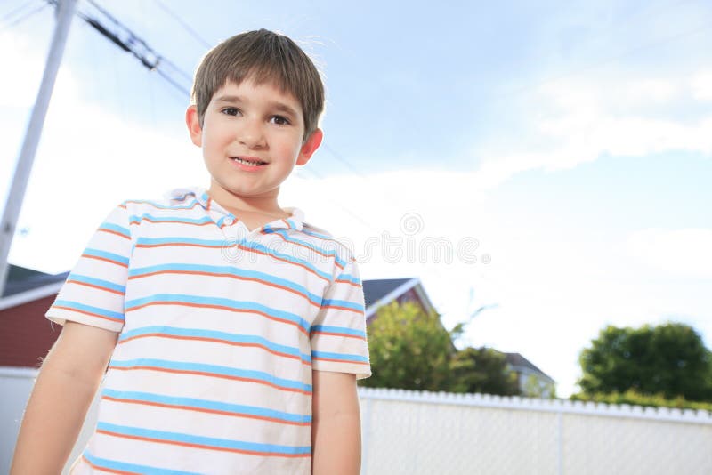 Closeup of cute young teen boy smiling