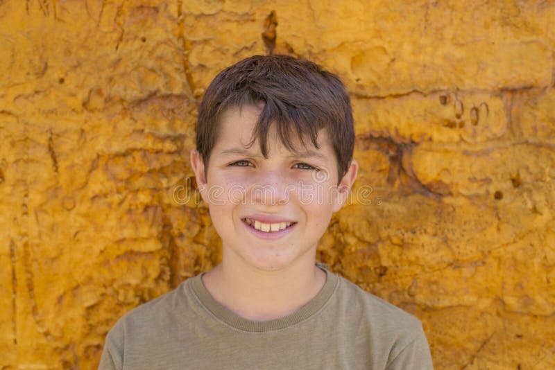 Closeup of cute young teen boy smiling