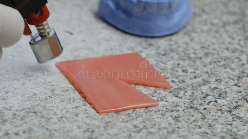 Closeup of a dental technician making of denture in a dental lab stock video footage